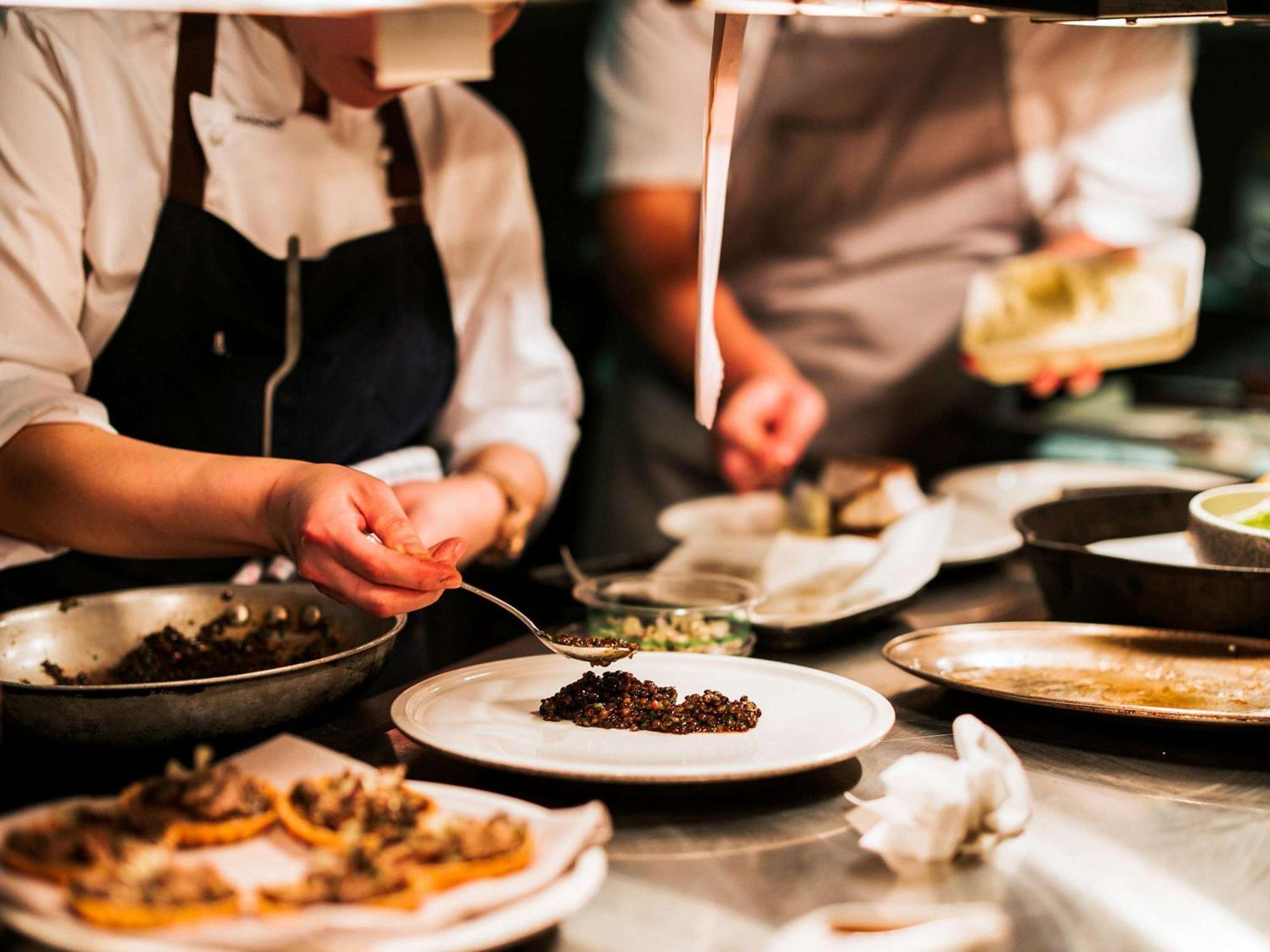 The Playford Adelaide - Mgallery Buitenkant foto A chef plating a dish